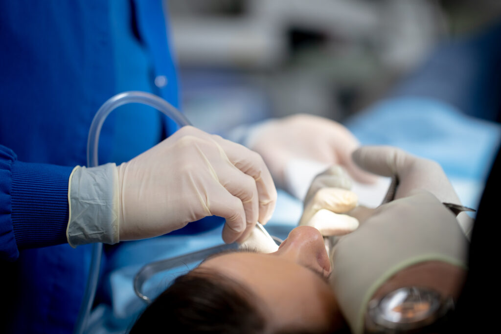 Patient receiving facial trauma treatment and sedation dentistry at Associated Oral & Implant Surgeons