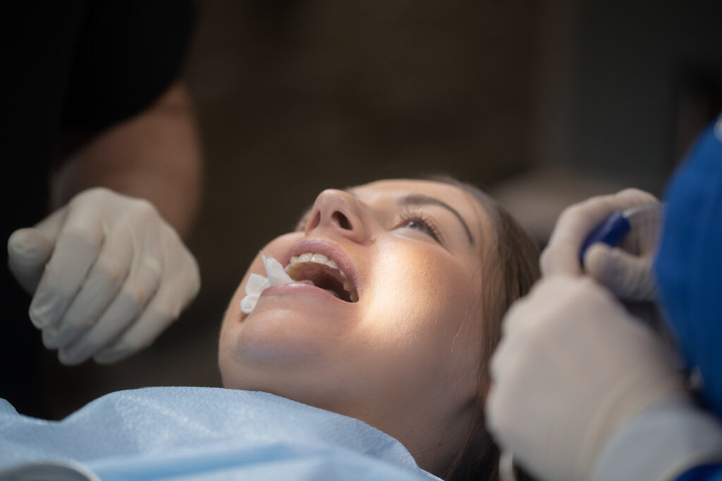 patient receiving wisdom teeth post operative instructions following wisdom teeth extraction at Associated Oral & Implant Surgeons