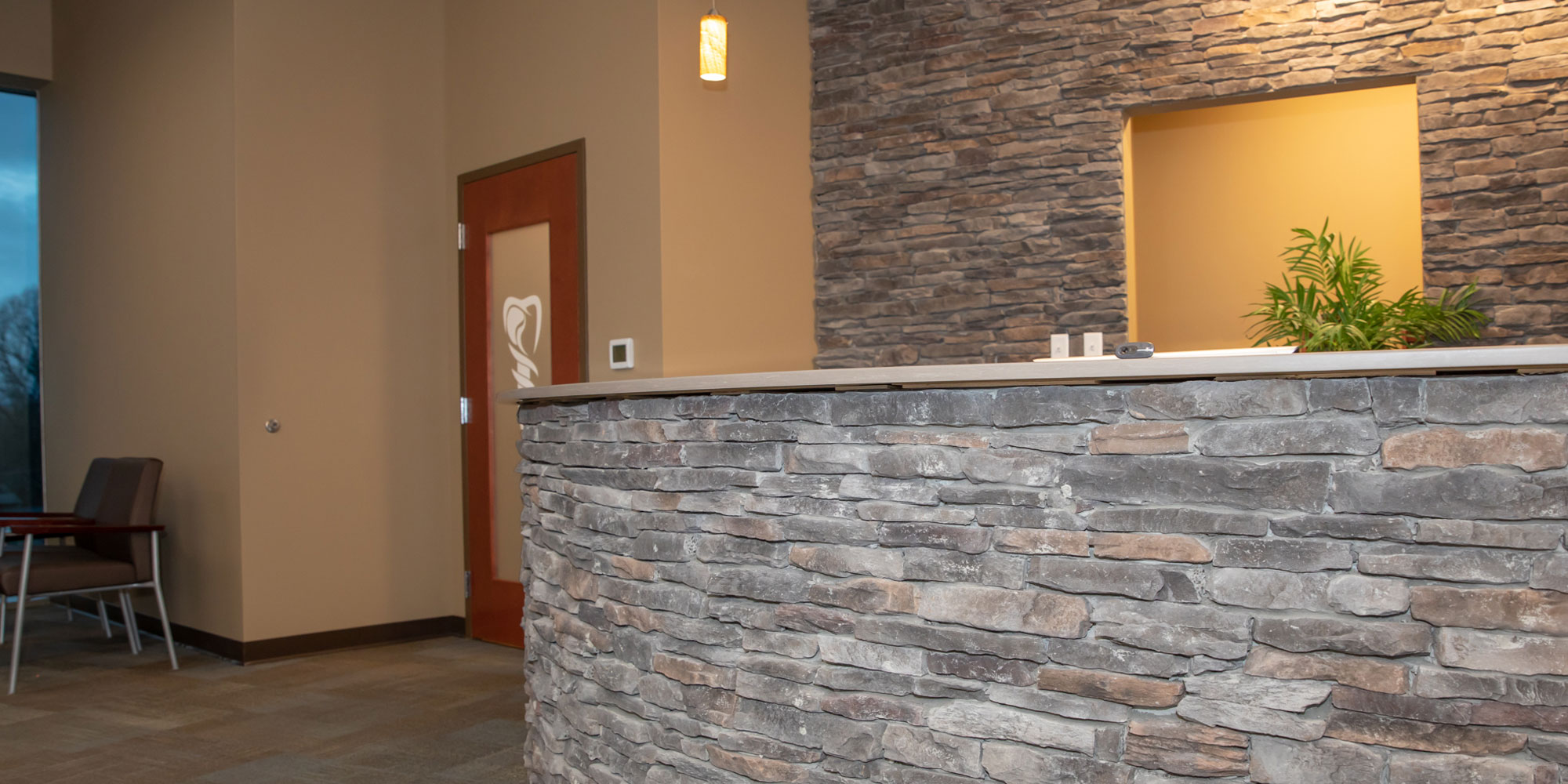 the front desk of one of the three locations of Associated Oral & Implant Surgeons locations