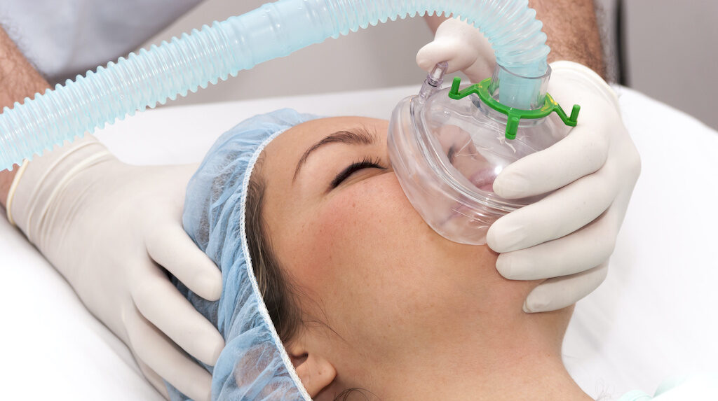 Woman getting general anesthesia for her upcoming sedation dentistry oral procedure