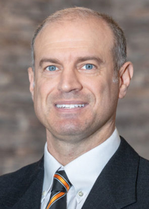 Headshot of Dr. Michael Foster at Associated Oral & Implant Surgeons