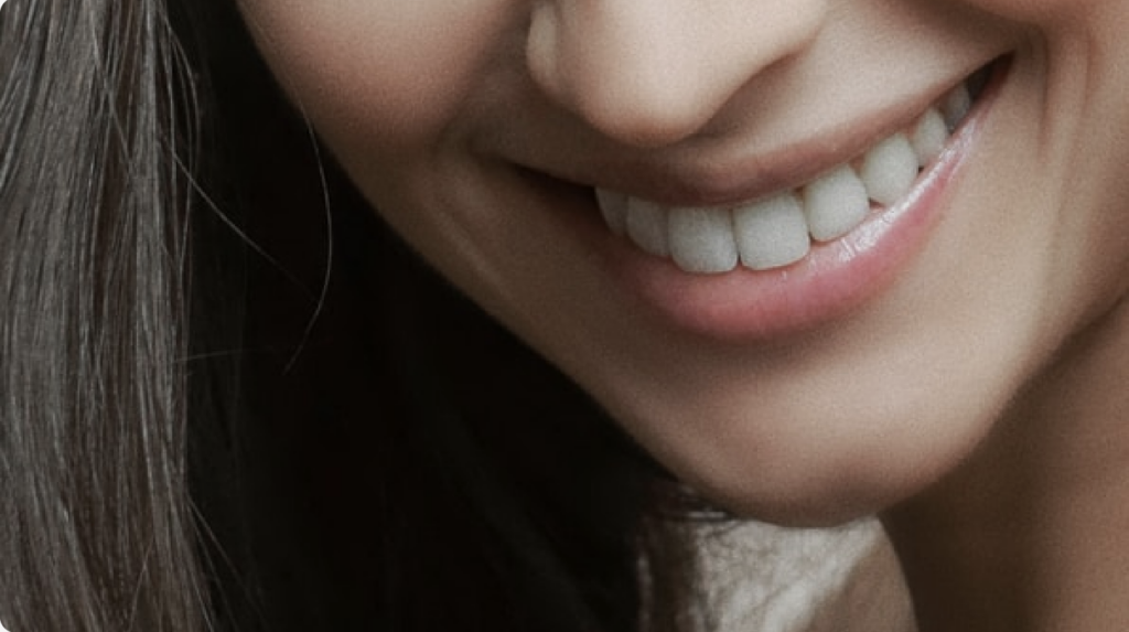 woman's smiling mouth showing beautiful teeth